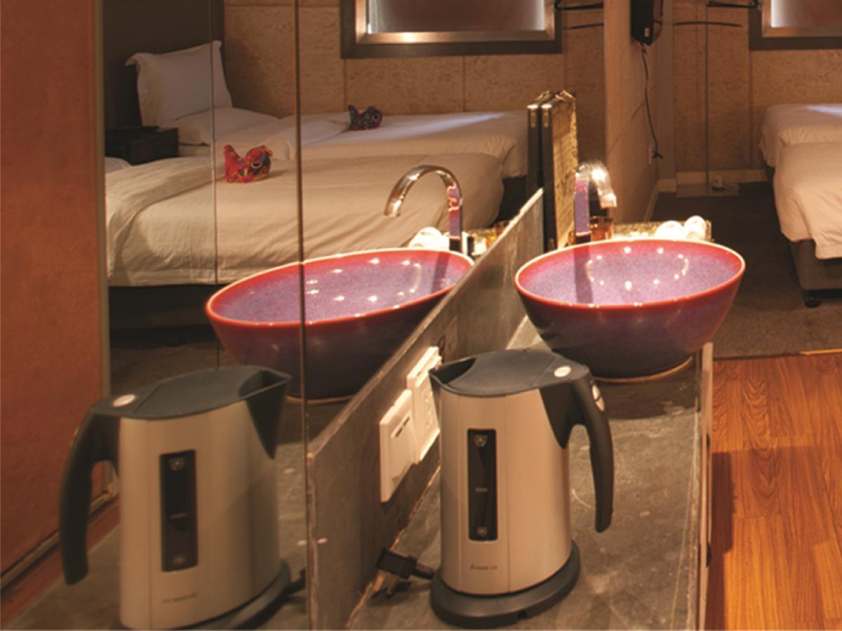 China Community Art Habitat Hotel Qingdao Habitación foto